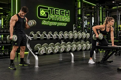 Athletes Training with Cast Iron Dumbbells in a Commercial Gym
